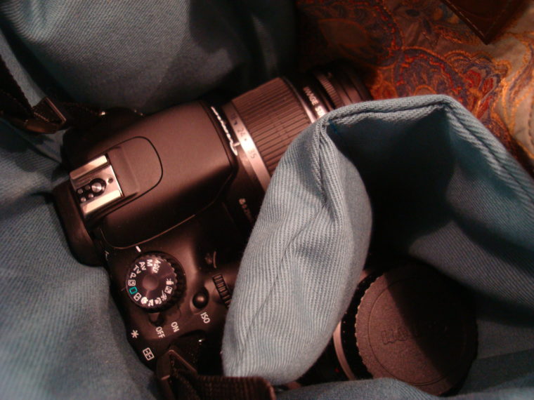 DSLR and lens in camera bag