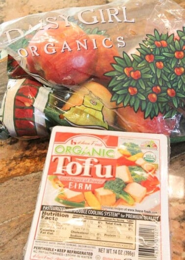 Bag of Apples and package of tofu