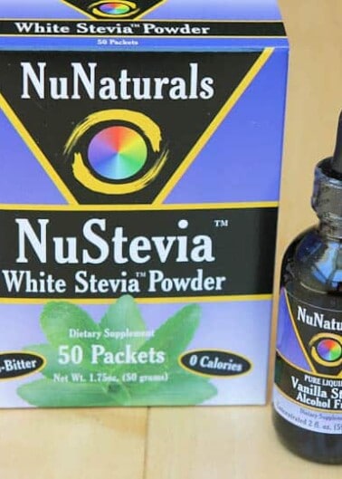 A package of nunaturals nustevia white stevia powder alongside a bottle of nunaturals liquid stevia.