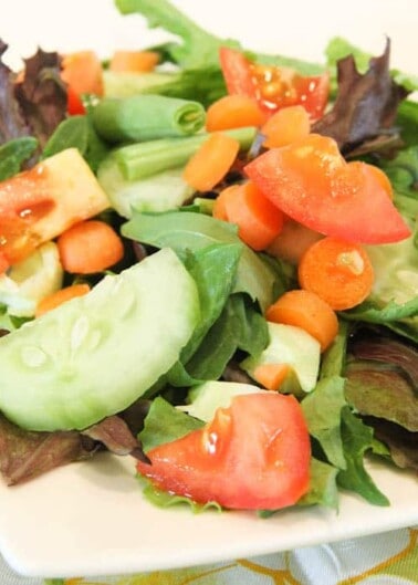 Close up of mixed green salad with vegetables