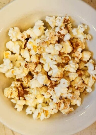 A bowl of freshly popped popcorn.