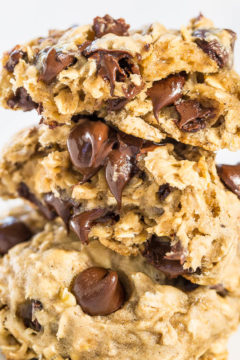 A close-up of a stack of homemade chocolate chip cookies.