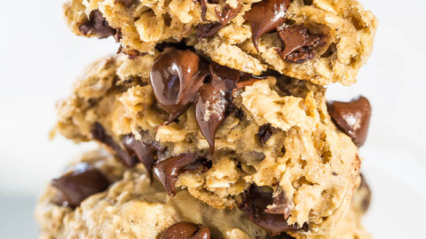 A close-up of a stack of homemade chocolate chip cookies.