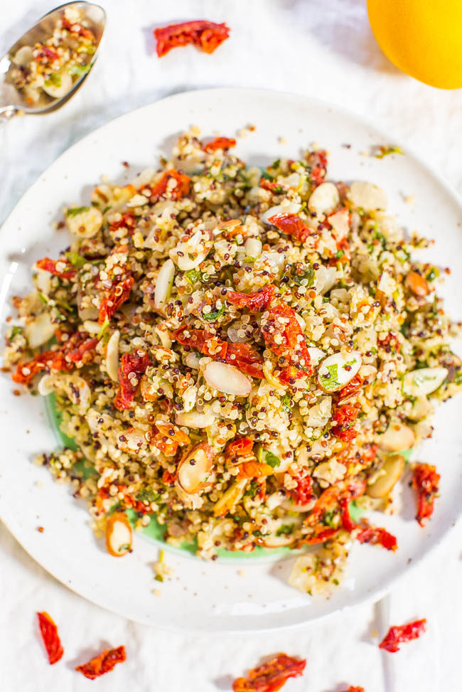 Lemon, Sun-Dried Tomato, and Almond Quinoa Salad - Fast, easy, and fresh! Bright flavors and loads of texture! This clean-eating salad keeps you full and satisfied! Healthy never tasted so good!! (No mayo and great for outdoor events or lunch boxes!)