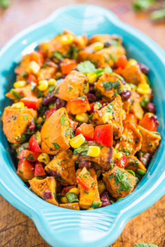 Roasted Sweet Potato Salad — This roasted sweet potato salad is tossed in a honey Dijon dressing. The sweet and savory flavors of this potato salad are to die for complete with red bell peppers, black beans, corn, cilantro, and tossed in a lemon Dijon light dressing!