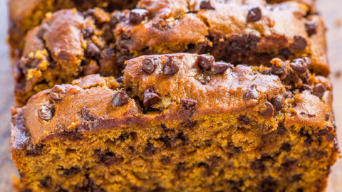 Chocolate chip banana bread on a wooden surface.