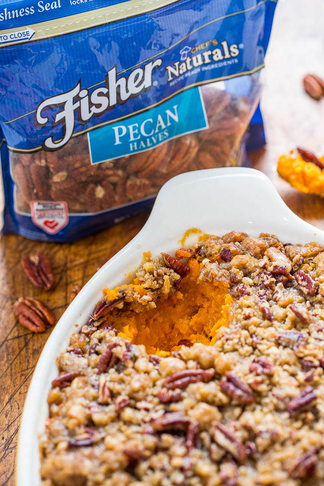the best sweet potato casserole in white baking dish next to bag of Fisher pecans