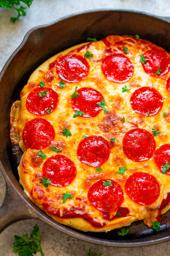 close up of a cast iron pizza