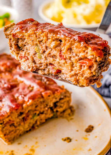 Cracker Barrel Meatloaf - This Cracker Barrel meatloaf copycat is tender, juicy, made with the restaurant's secret ingredients, glazed to tangy-sweet perfection, and sure to become a family FAVORITE comfort food dinner recipe! Air fryer AND oven baking options provided.