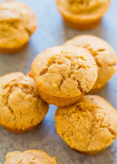 Freshly baked muffins on a kitchen countertop.