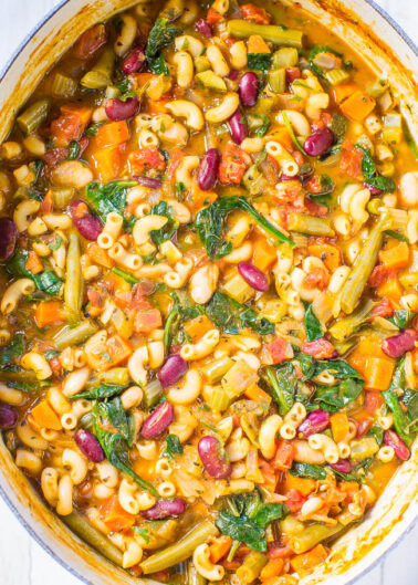 A hearty pot of minestrone soup with beans, pasta, and vegetables.