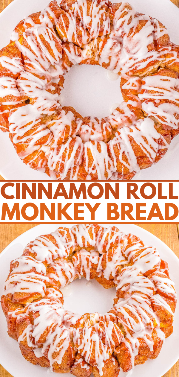 Cinnamon roll monkey bread arranged in a circular form, topped with white icing, displayed on a wooden surface.