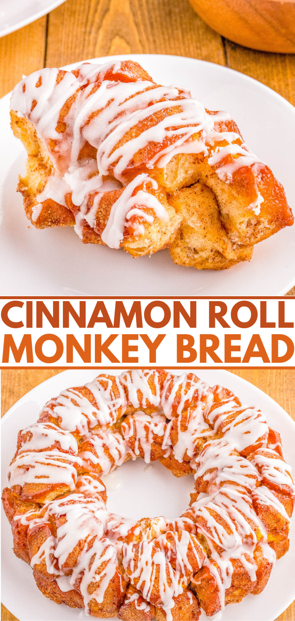 A cinnamon roll monkey bread in a ring shape, drizzled with white icing, displayed on a wooden table.