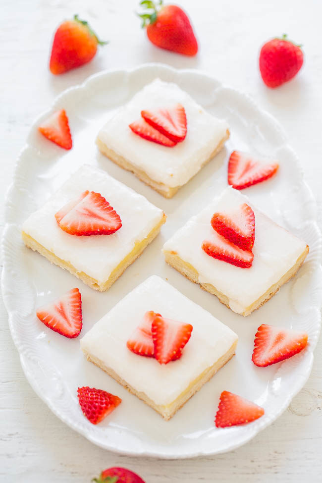 Strawberry Cream Cheese Shortbread Bars - A buttery shortbread crust topped with cream cheese filling, frosting, and strawberries!! EASY and perfect for spring and summer parties!!