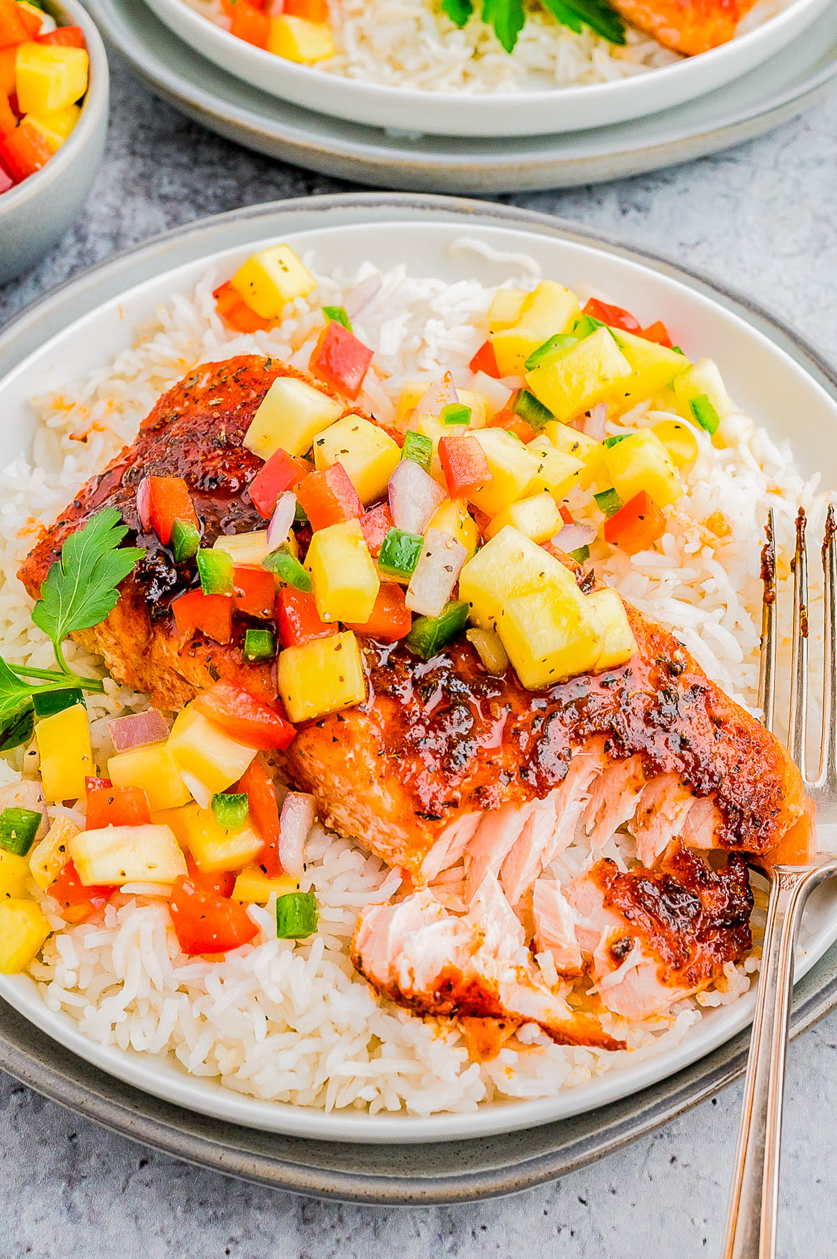 Baked Blackened Salmon - 😋🍍🙌🏻🥭 Rich, buttery salmon is baked with a homemade blackening season for restaurant-worthy salmon! It's perfectly smoky, a little bit spicy, and a little bit sweet. This salmon is tender, so EASY, bursting with flavor, and ready in just 15 minutes! Serve it with a fruit salsa for even more juicy flavor!