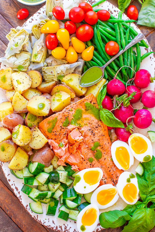 Salmon Niçoise Salad with Basil Vinaigrette - An ELEGANT French-inspired salad with juicy salmon, tender potatoes, soft-boiled eggs, crispy haricots verts, and more - all drizzled with a super FLAVORFUL fresh basil vinaigrette!! This BEAUTIFUL salad has something for everyone!!