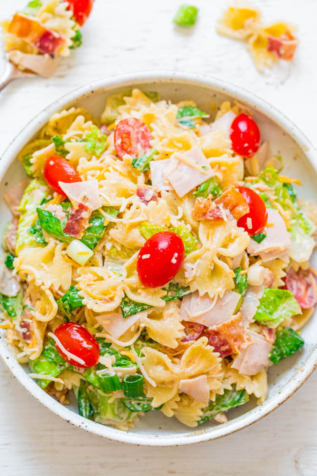 Club Sandwich Pasta Salad - All your favorite club sandwich ingredients in an EASY pasta salad!! Turkey, bacon, tomatoes, lettuce, and cheese with ranch! Ready in 15 minutes and perfect for potlucks, picnics, and parties!!