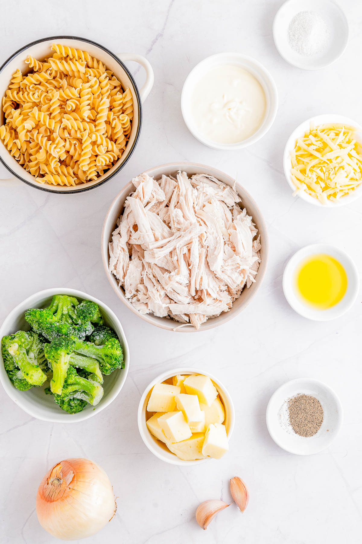 Chicken Noodle Casserole - 🍗🙌🏻💛 A modern spin on classic chicken noodle casserole and my EASY recipe does NOT use condensed soup. Instead, there's two types of melted cheese, juicy shredded chicken in every bite, and perfectly cooked noodles! This comfort food family favorite recipe comes together in 30 minutes so it's doable on busy weeknights, especially when the weather is chilly and you need a hearty dish! 