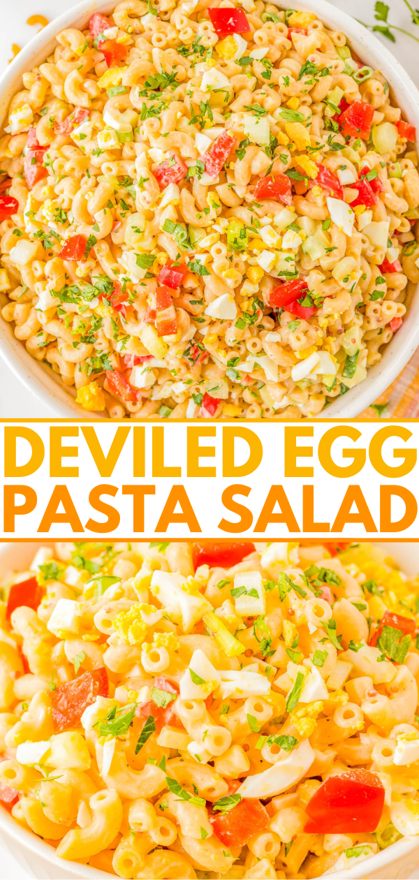 A bowl of deviled egg pasta salad garnished with chopped fresh herbs and diced red bell peppers. The dish features small pasta shapes mixed with a creamy sauce and bits of boiled eggs.