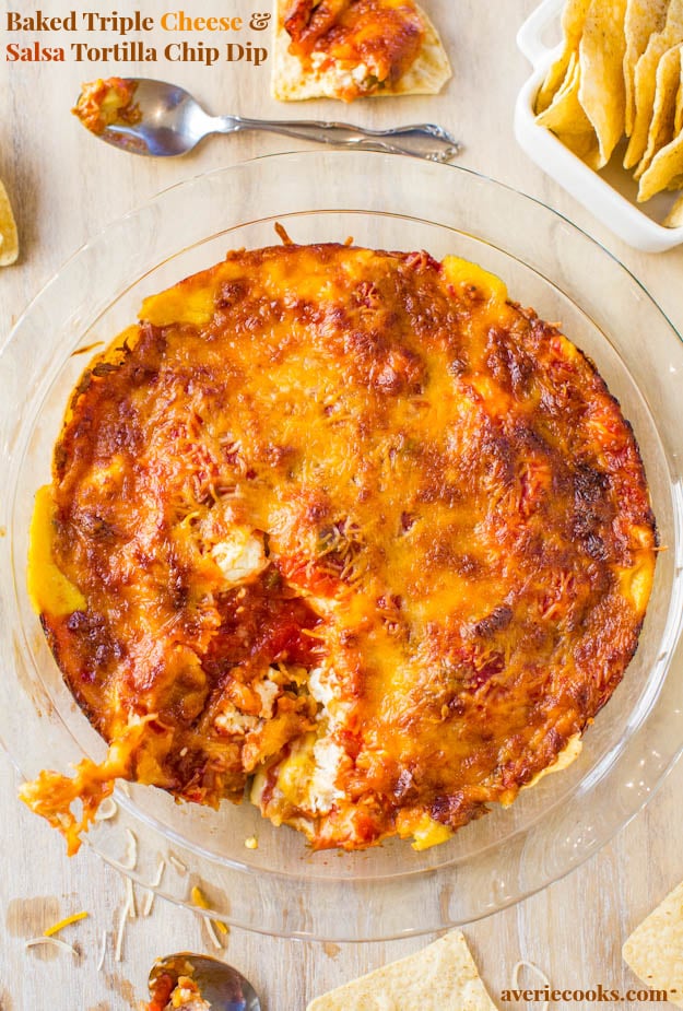 Baked Triple Cheese & Salsa Tortilla Chip Dip - Loaded with 3 kinds of cheese & baked to browned, bubbly, golden perfection! Always a hit at parties & great for Superbowl! Easy recipe at averiecooks.com