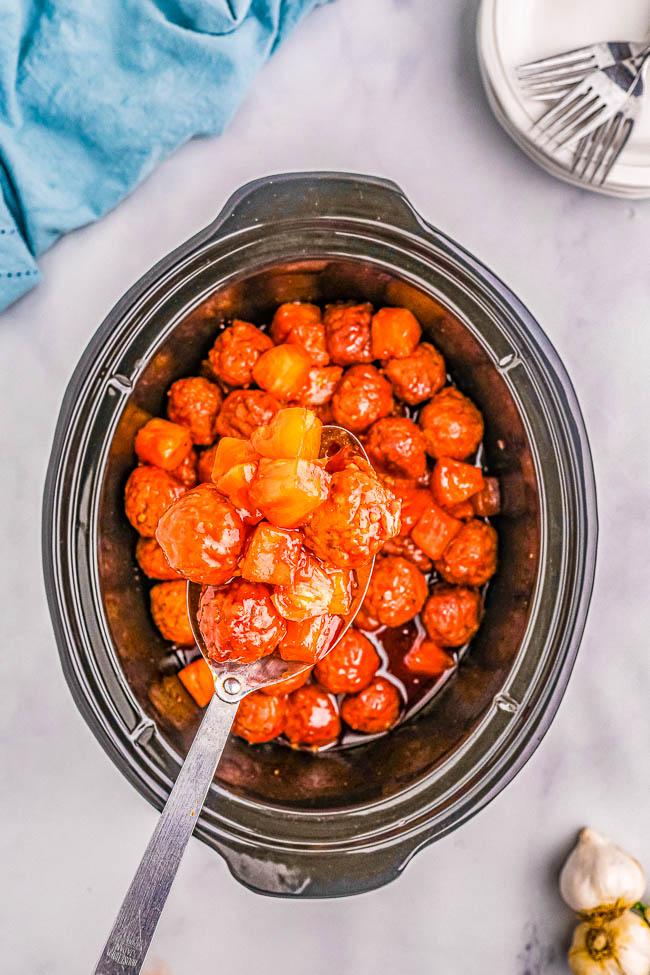 Slow Cooker Hawaiian Meatballs – The EASIEST meatball recipe that’s sure to be a hit at parties and events! Or turn this into a no-fuss weeknight meal and serve these pineapple-infused Hawaiian meatballs over rice! Made with only 6 ingredients so you can just set your slow cooker and let it do all the work!