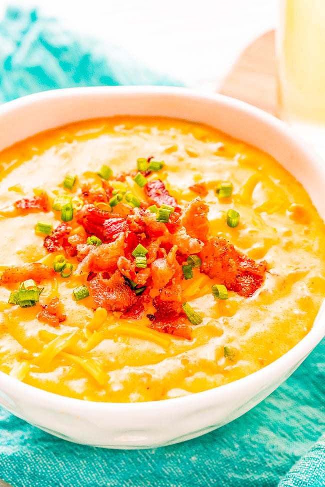 Beer Cheese Soup - The BEST recipe for decadent beer cheese soup that's loaded with flavor, including two different types of cheeses! A comfort food family favorite soup that's perfect for chilly weather. You can even make it on busy weeknights because it's a one-pot recipe that's ready in 30 minutes!