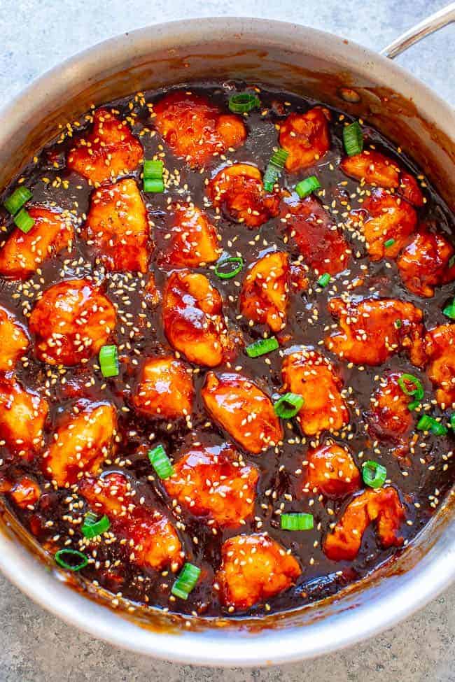 Better-Than-Takeout Sticky Chicken - Stop calling for takeout or going to the mall food court and make this AMAZING sticky chicken at home in 15 minutes!! So EASY with the perfect balance of sweet and spicy with plenty of sticky sauce!! 