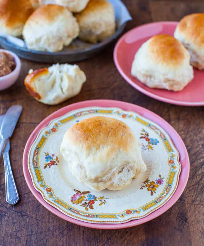 Soft & Fluffy Sweet Dinner Rolls — Lightly sweetened from the honey in the dough and brushed with honey-butter prior to baking!! These dinner rolls are made from scratch and are baked to golden brown perfection! 