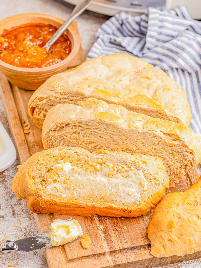 Slow Cooker Bread - 🍞🙌🏻💛 Learn how to make yeast bread in your Crock-Pot in less than 2 hours! Knead it briefly once, place the dough in your slow cooker, and let it do all the work! This is the EASIEST loaf of homemade bread you'll ever make! It has a crunchy crust with a soft and chewy center and is lovely toasted, as sandwich bread, or use it like you'd use French bread to sop up pasta sauce or dunk into soup.