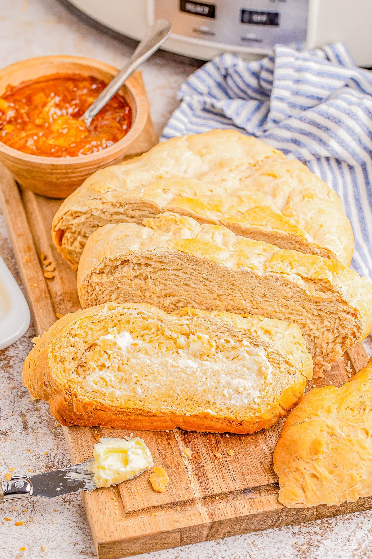 Slow Cooker Bread - 🍞🙌🏻💛 Learn how to make yeast bread in your Crock-Pot in less than 2 hours! Knead it briefly once, place the dough in your slow cooker, and let it do all the work! This is the EASIEST loaf of homemade bread you'll ever make! It has a crunchy crust with a soft and chewy center and is lovely toasted, as sandwich bread, or use it like you'd use French bread to sop up pasta sauce or dunk into soup.