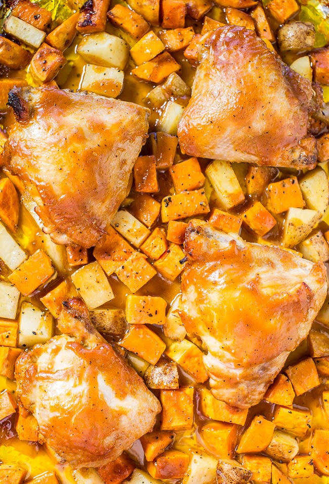 One-Pan Barbecue Chicken and Roasted Sweet Potatoes - Juicy chicken and tender potatoes roasted on one pan!! The barbecue sauce keeps everything super moist and flavorful!! Fast, easy, and zero cleanup!