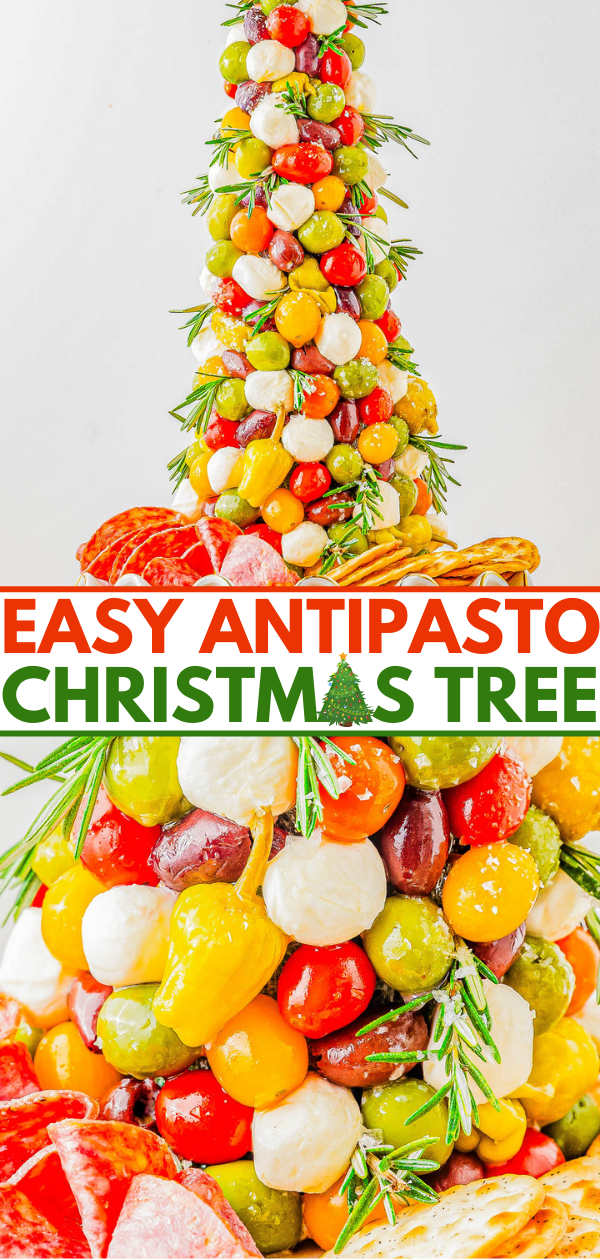 Antipasto Christmas tree made of skewered cherry tomatoes, mozzarella, olives, and herbs, with a base of sliced meats and cheeses.